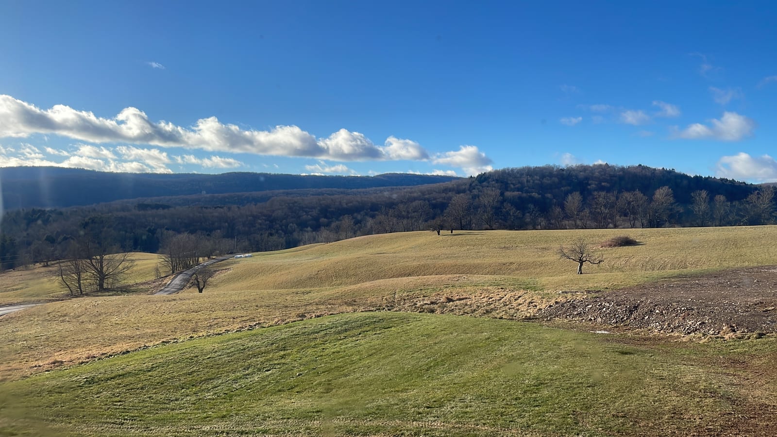Open pasture folding over the ridgelines above Andes in the Western Catskills